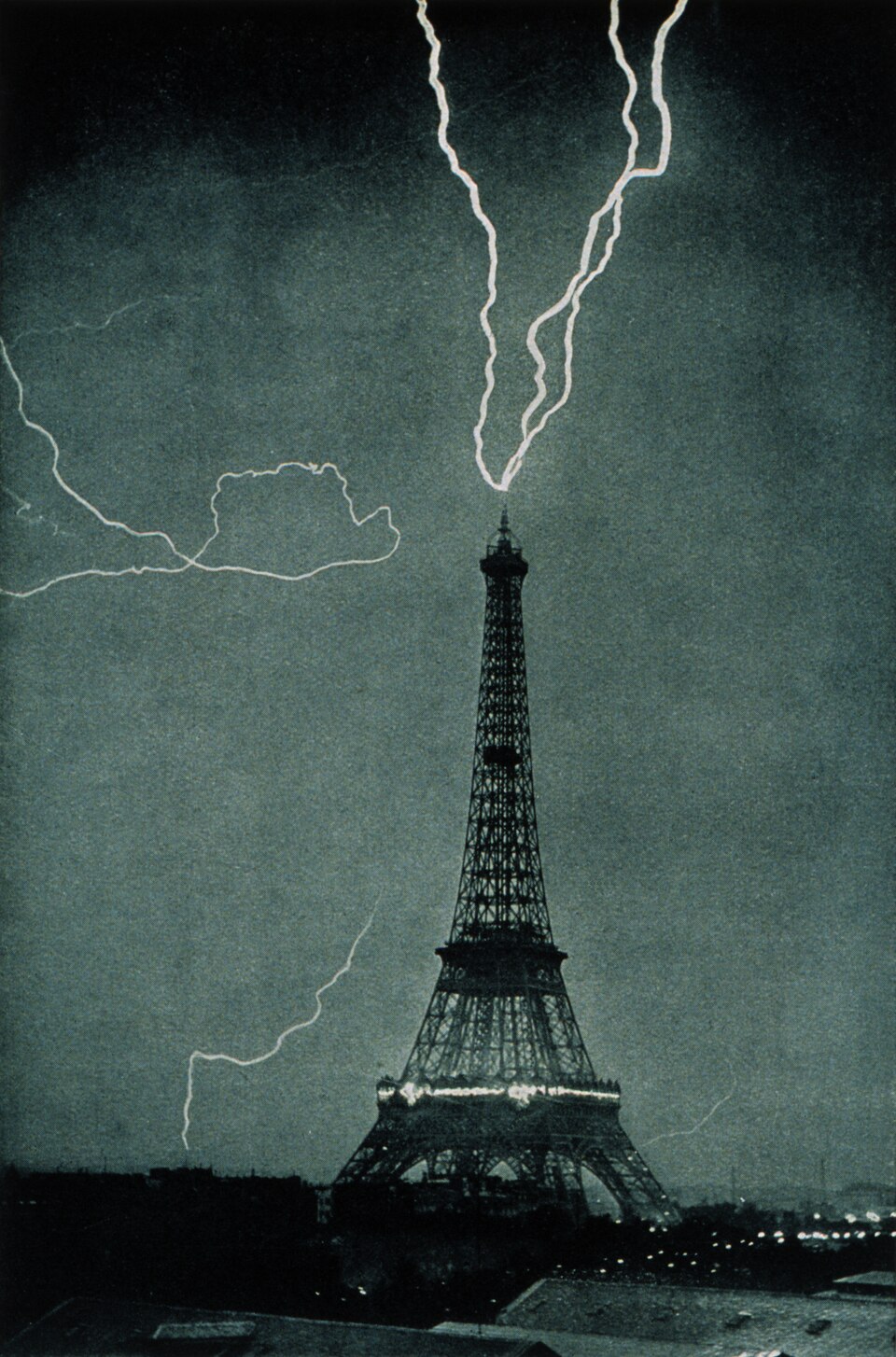 Lightning striking the Eiffel Tower, 3 June 1902, one of the earliest photos of lightning in a city, Paris, France
