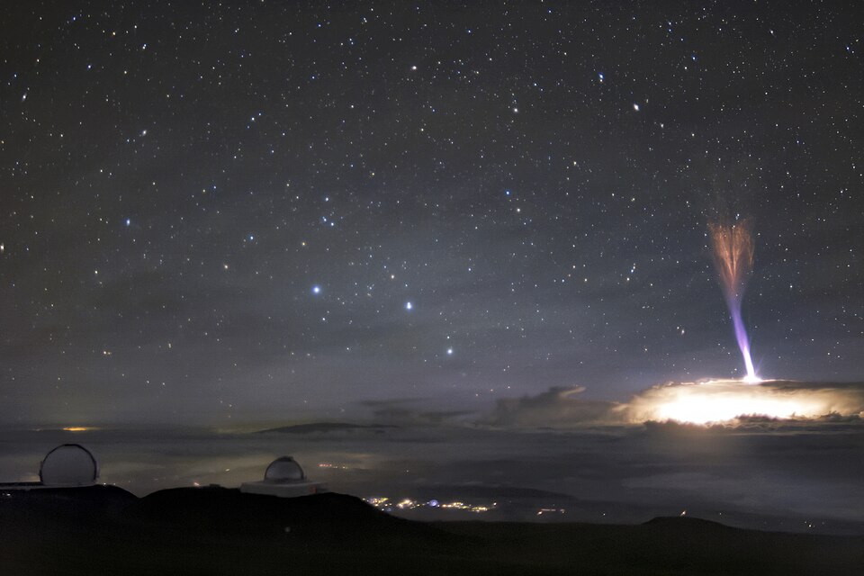 A rare gigantic jet leaping 50 to 90 km up from a storm towards space, Mauna Kea, Hawaii